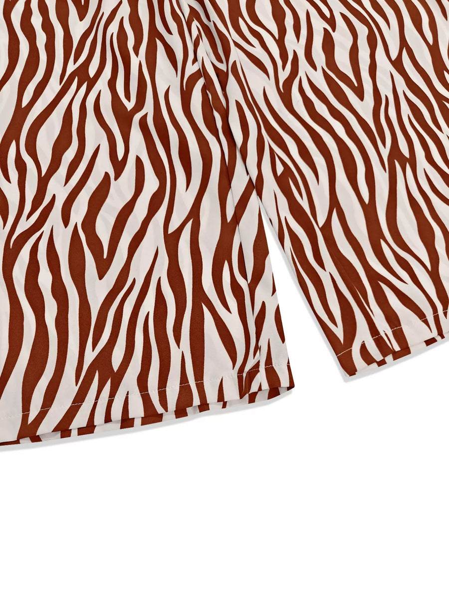 Brown zebra print relaxed fit loungewear top with a relaxed cut.