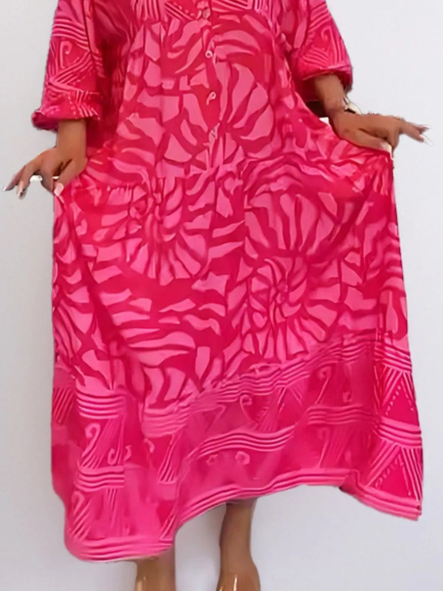 Hot Pink abstract print midi dress with button front and ruffled sleeves.