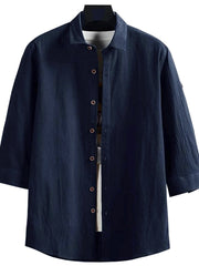 Men's navy blue casual button-down shirt with 3/4 sleeves and cotton blend fabric.