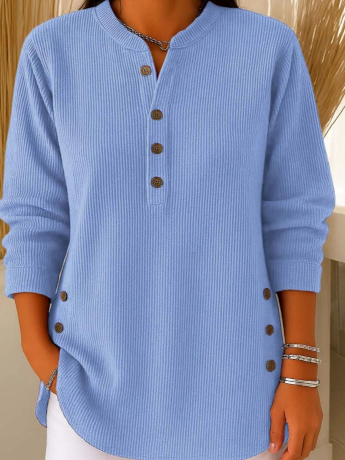 Gray henley with decorative side buttons and long sleeve