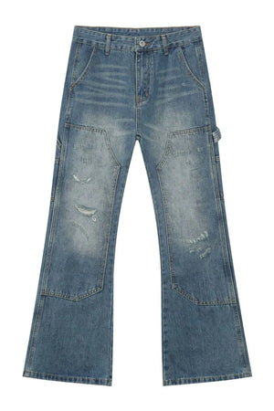 Carpenter flare jeans in medium wash denim with distressed details and a relaxed fit.