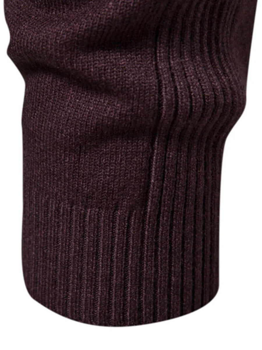 Plum purple ribbed sweater with mock neck detail and sculpted shoulder.