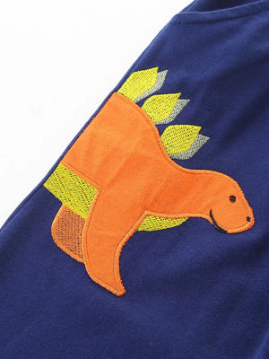Toddler navy cotton sweatpants with orange dinosaur appliqué detail.