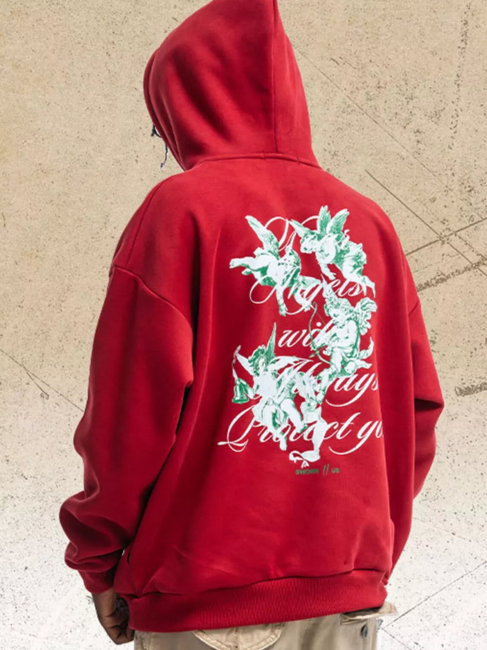 Red cotton blend graphic sweatshirt with cherub print and long sleeves.