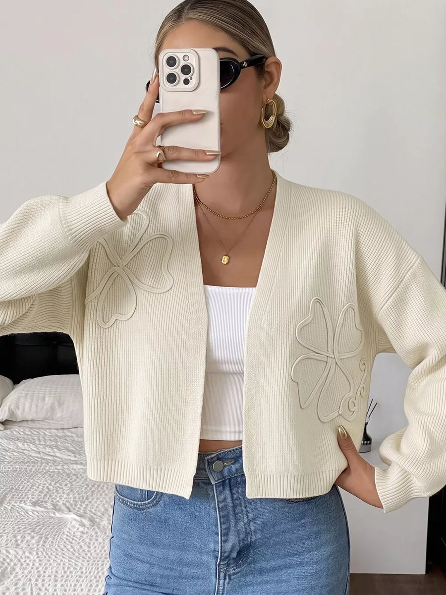 65% polyester, 13% plyamide, 13% acrylic, 6% wool, 3% elastane Care instructions cardigan in cream with relaxed silhouette