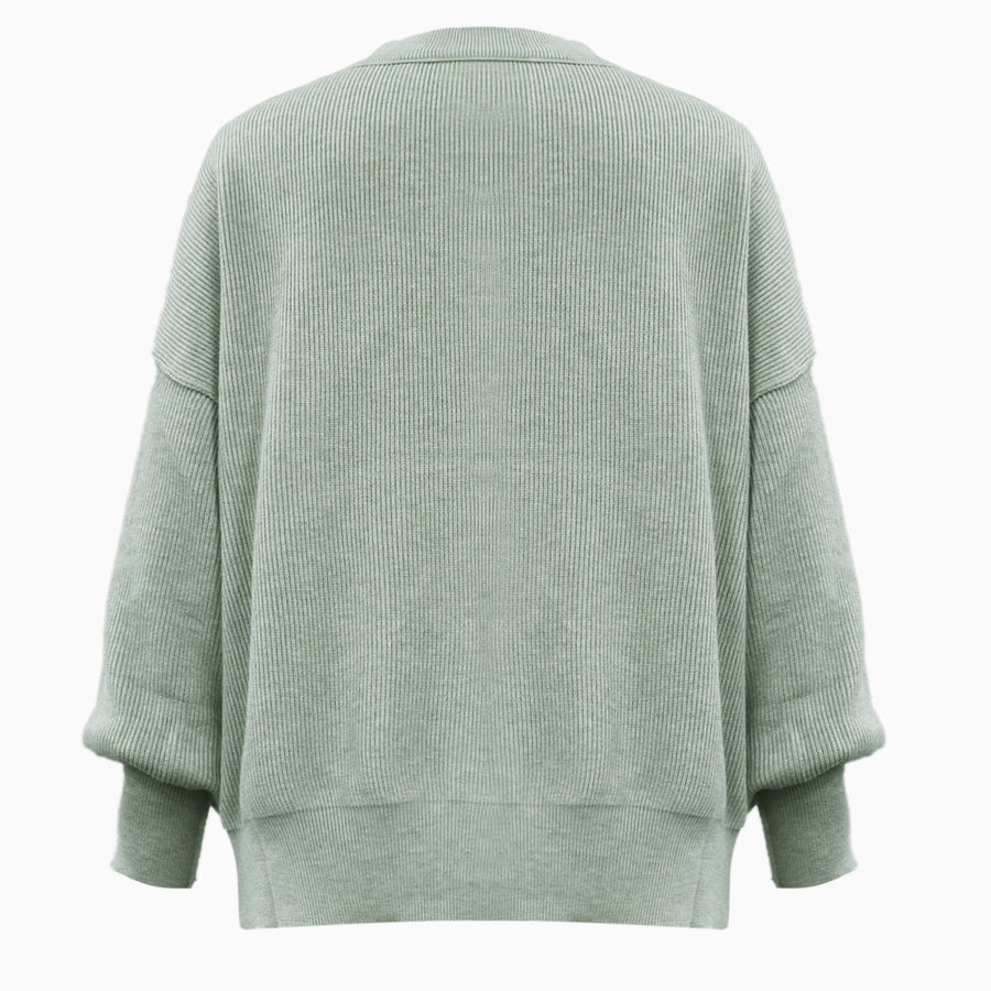 Sage ribbed knit sweater with slouchy sleeves and a relaxed fit.