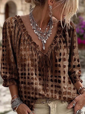 blouse in Brown with tied and hip-length