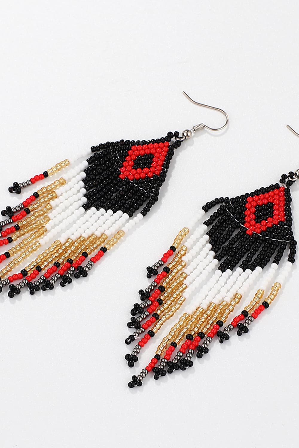 Beaded diamond fringe earrings in black, white, red, and gold with a boho style.