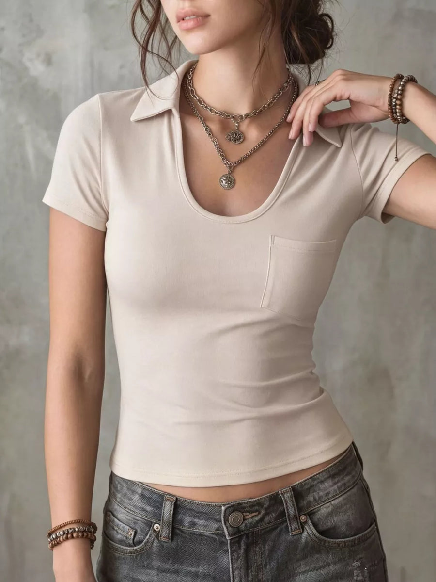 Scoop neck slim fit polo t-shirt in beige with a chest pocket and short sleeves.
