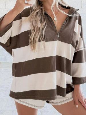 Quarter-zip sweatshirt in chocolate and cream stripes with a relaxed fit and a zippered neckline.