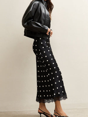 midi skirt featuring polka dot in black with 100% polyester Care instructions: Machine wash cold texture