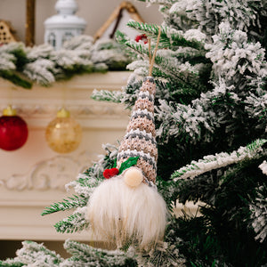 Gnome ornament with striped knit hat and white beard