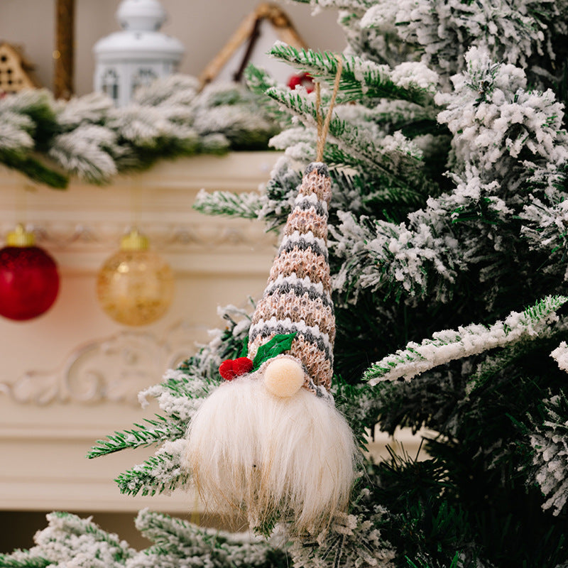 Gnome ornament with striped knit hat and white beard