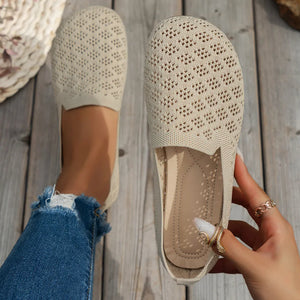 Beige diamond knit loafers with a breathable perforated pattern.