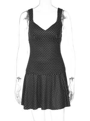 Black polka dot crop top and flared skirt set with sweetheart neckline.
