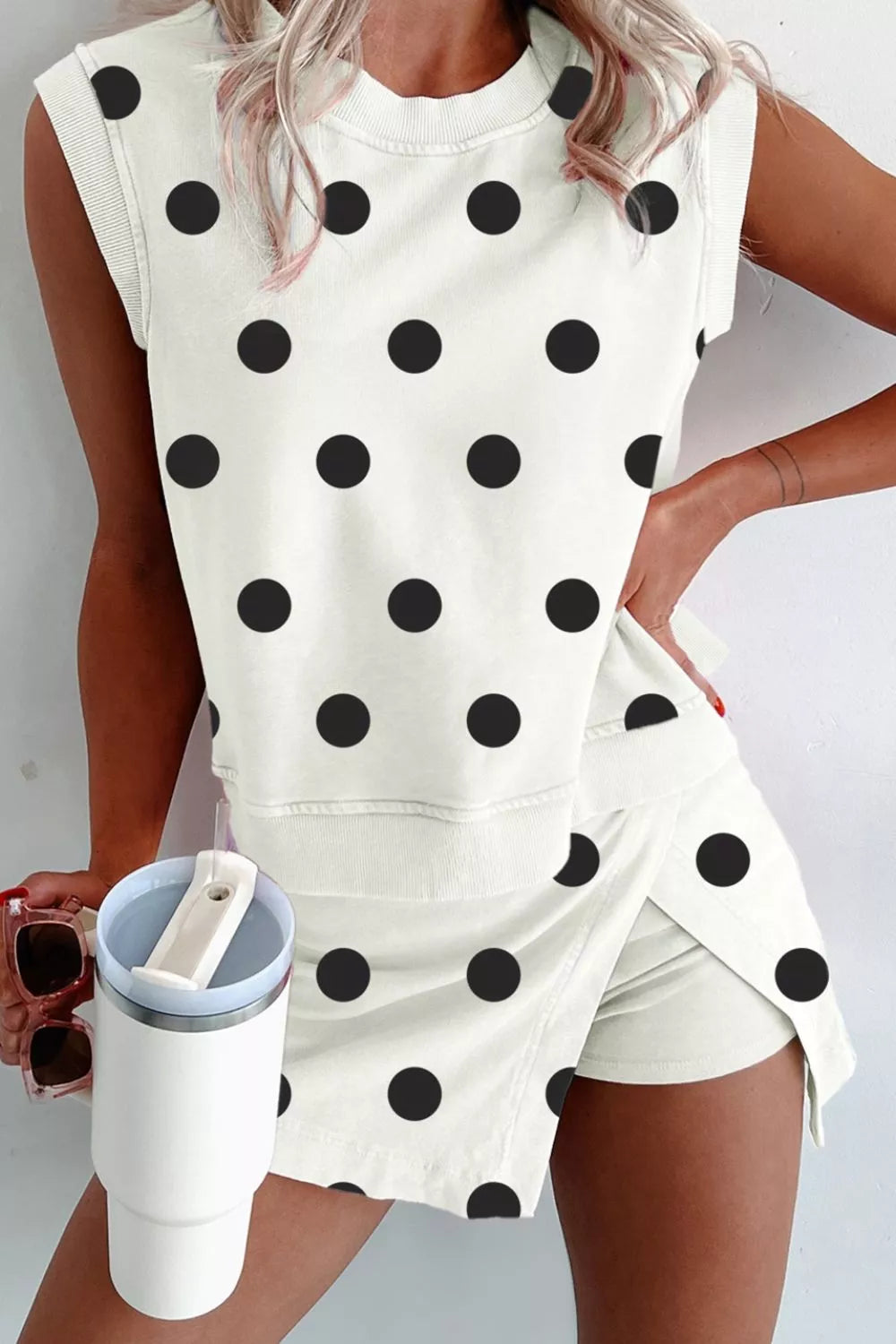 White polka dot ribbed trim two-piece set with sleeveless top and shorts.