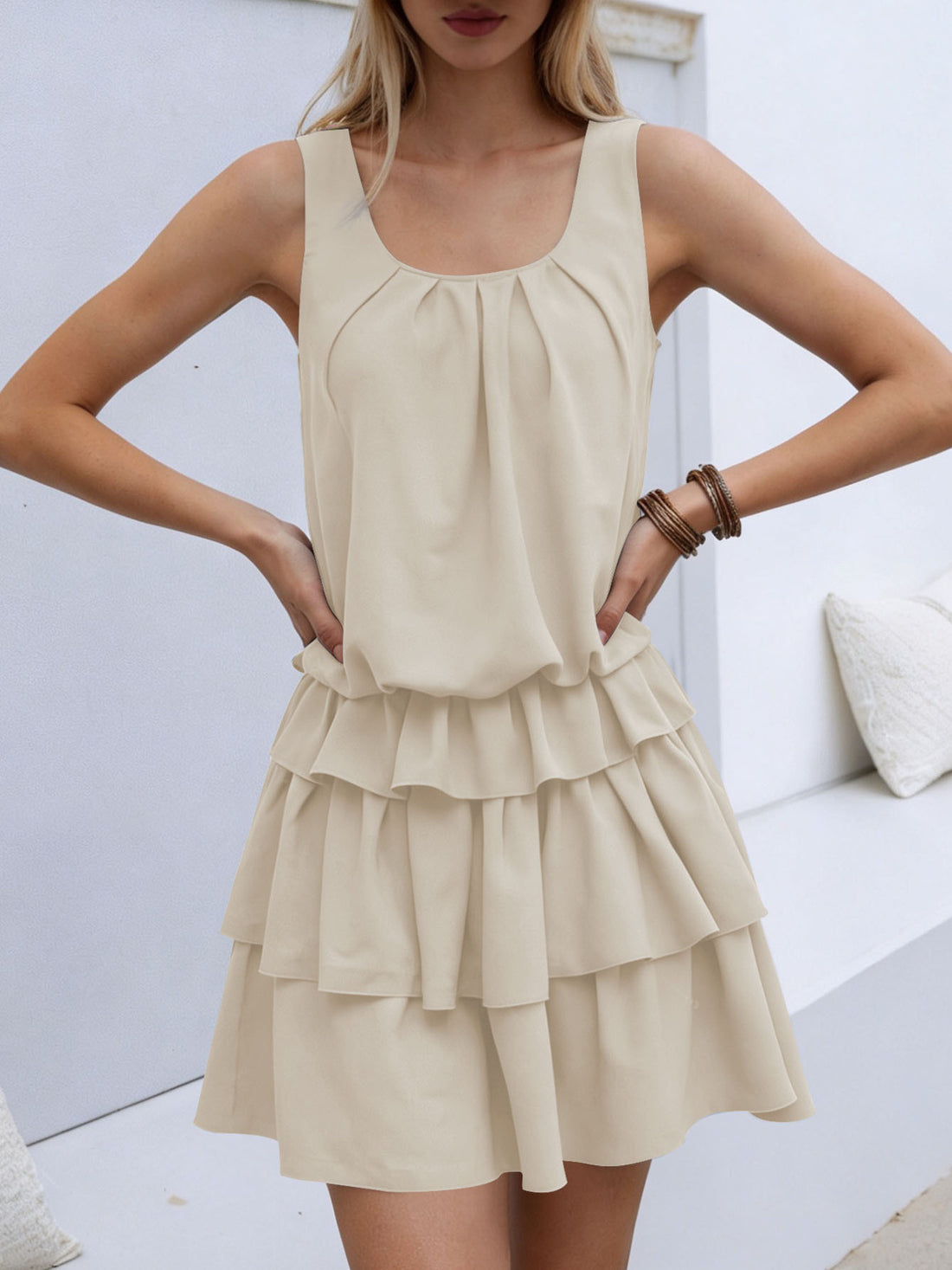 Khaki ruffled tiered mini dress with a gathered neckline and elastane.