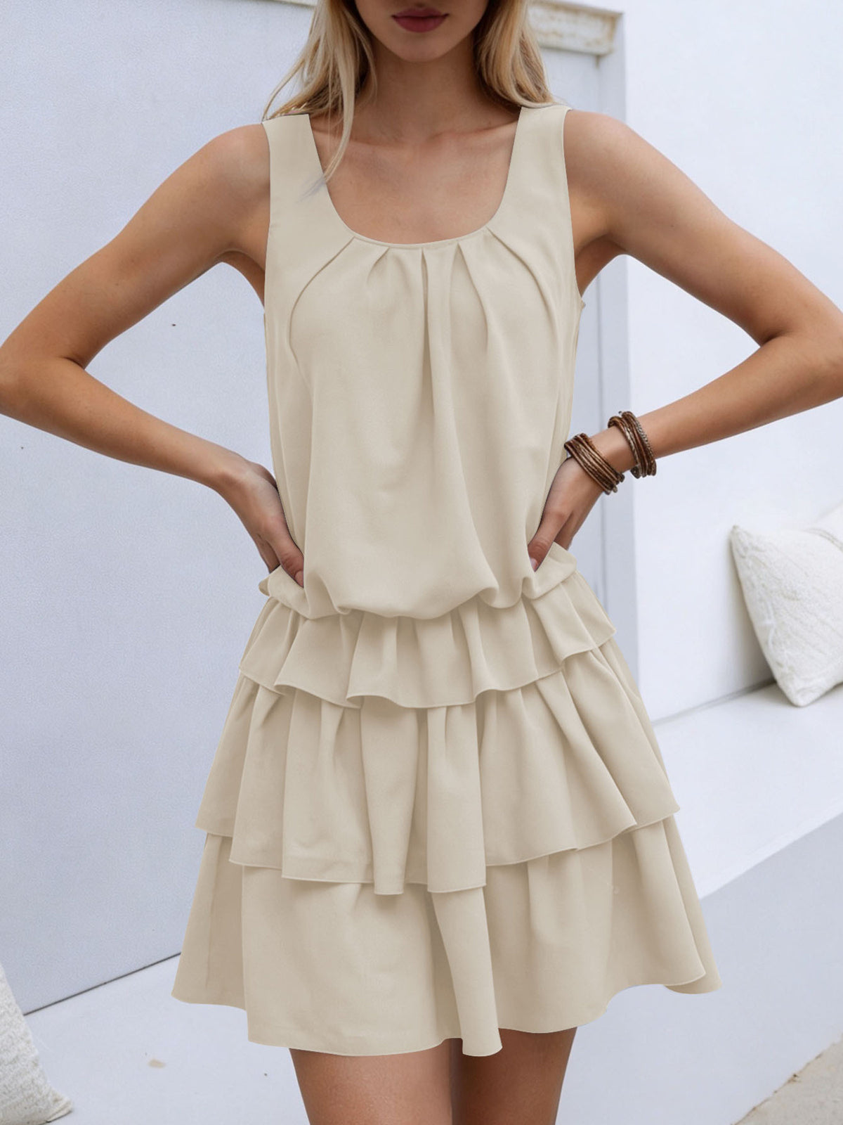 Khaki ruffled tiered mini dress with a gathered neckline and elastane.