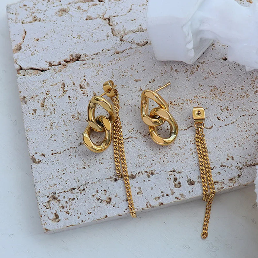 Gold linked chain drop earrings with delicate chain fringe detail