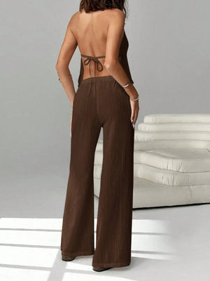 Brown halter neck cami and relaxed fit pants set with drawstring waist.