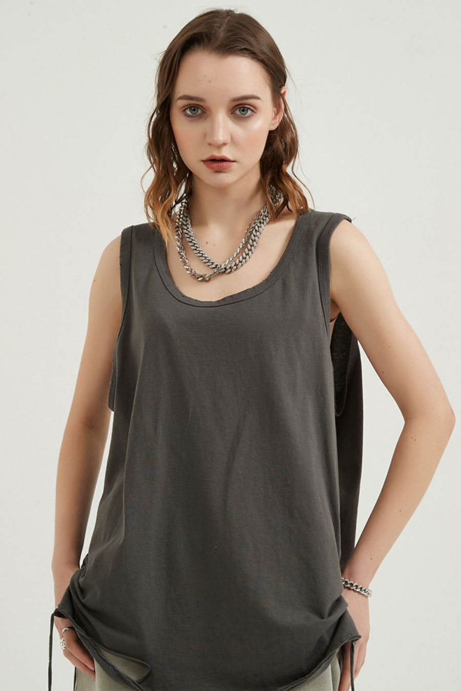 Dark grey sleeveless scoop neck tank top with raw hem