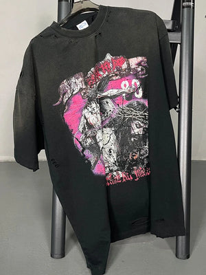 Black oversized ripped graphic tee with distressed details and bold print