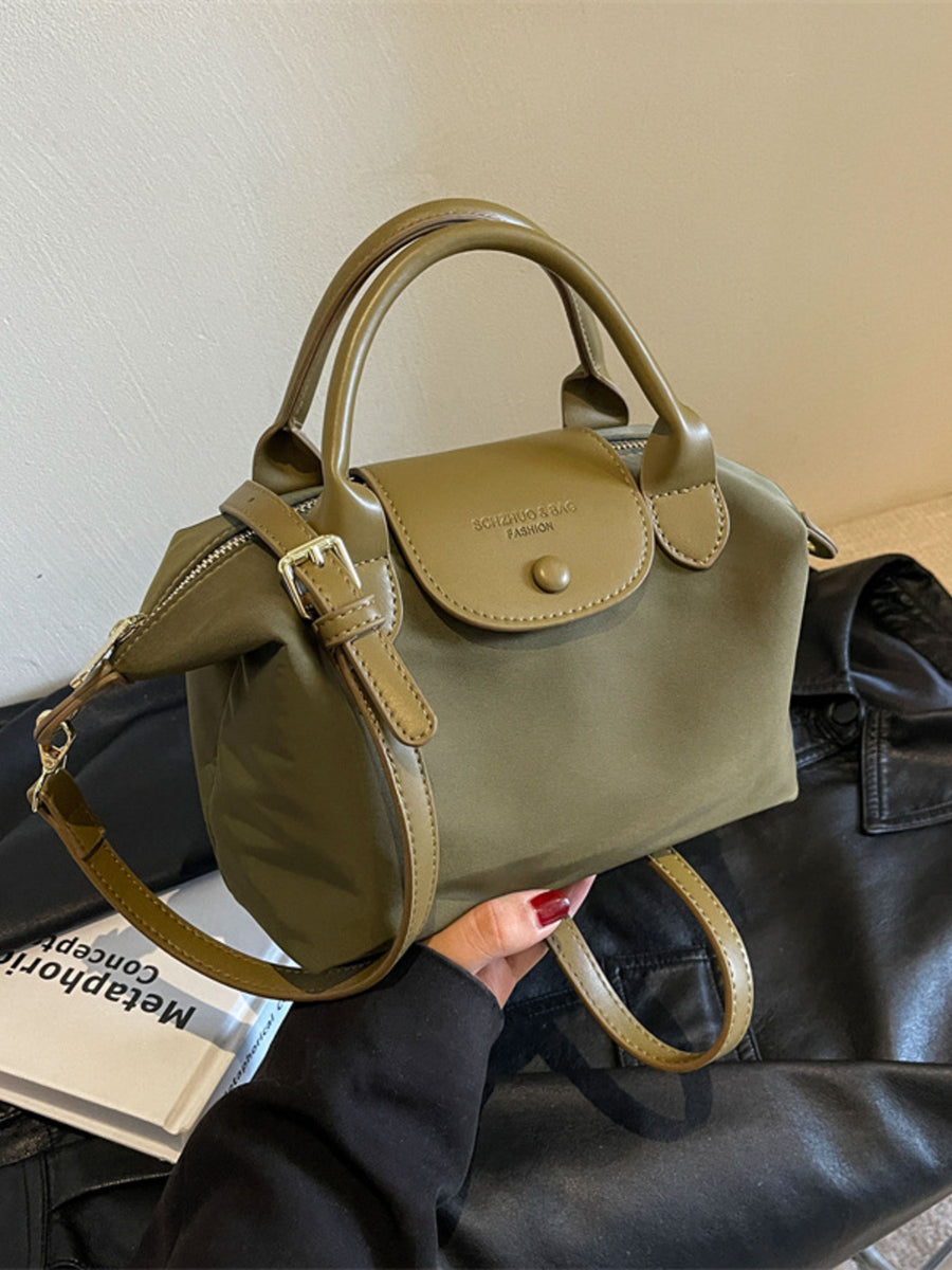Mini green nylon crossbody bag with flap and adjustable strap