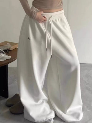 wide-leg pants in Gray with drawstring waist and full-length