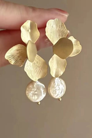 off-white earrings featuring drop design and geometric