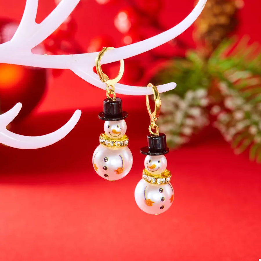 white earrings featuring rhinestone embellishment and novelty