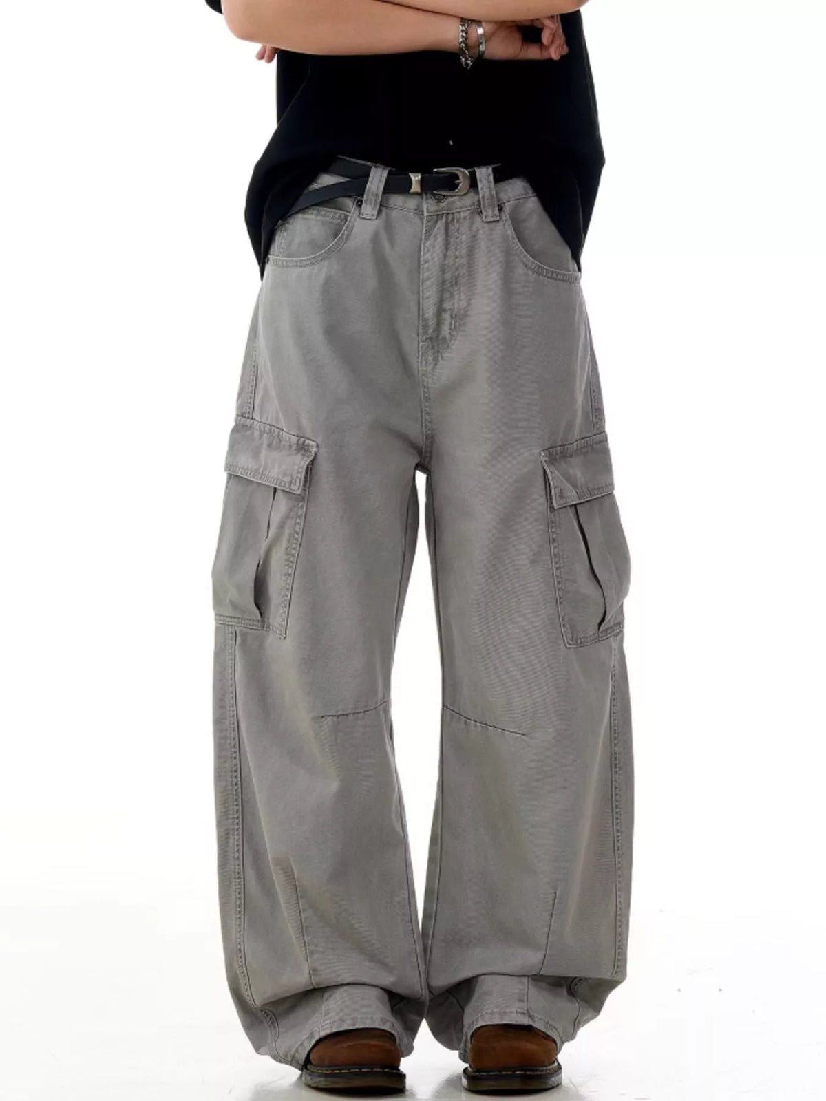 Men's grey wide-leg cargo pants with multiple pockets and a relaxed fit.