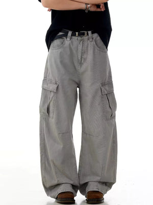 Men's grey wide-leg cargo pants with multiple pockets and a relaxed fit.