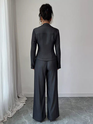 Gray button-up shirt and wide-leg pants set with contrast stitching.