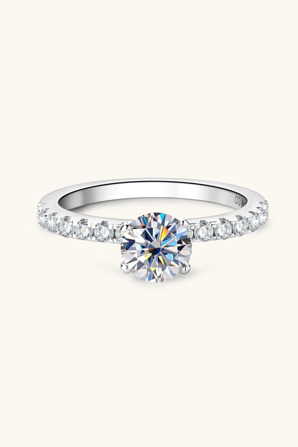 Sparkle Luxe Platinum Moissanite Statement Ring in silver, 925 sterling silver with a round cut moissanite and pave band.