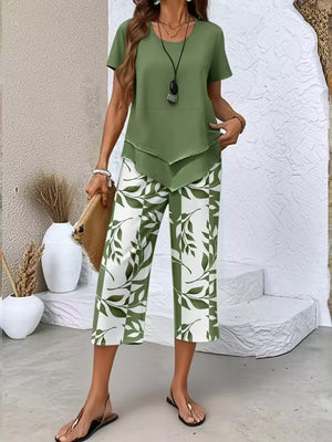 Green layered short sleeve top with leaf print capri pants.