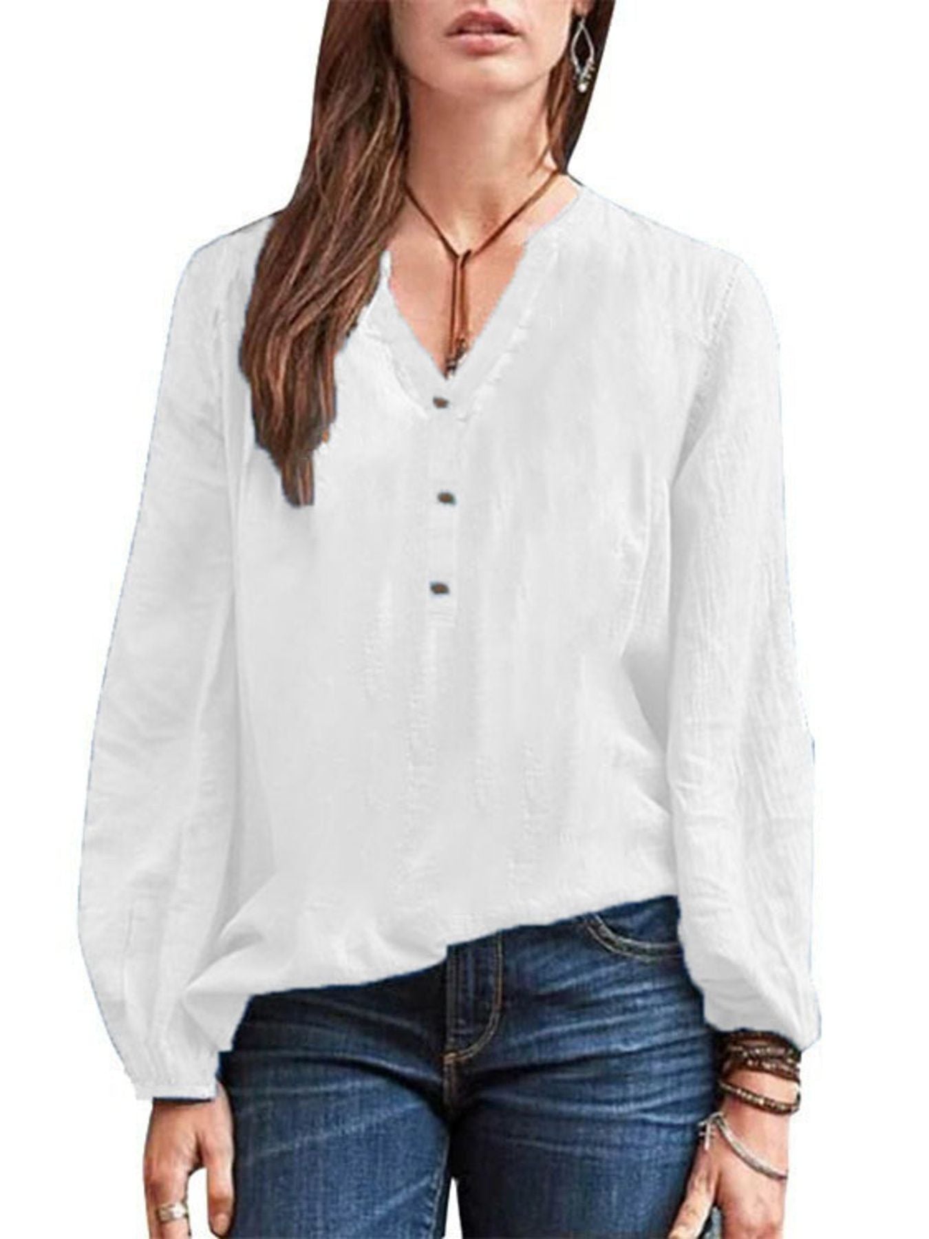 White long-sleeve blouse with notched neckline and button detail