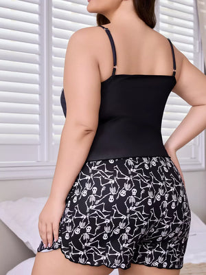100% polyester Care instructions: Machine wash cold pajama set in Black with relaxed silhouette