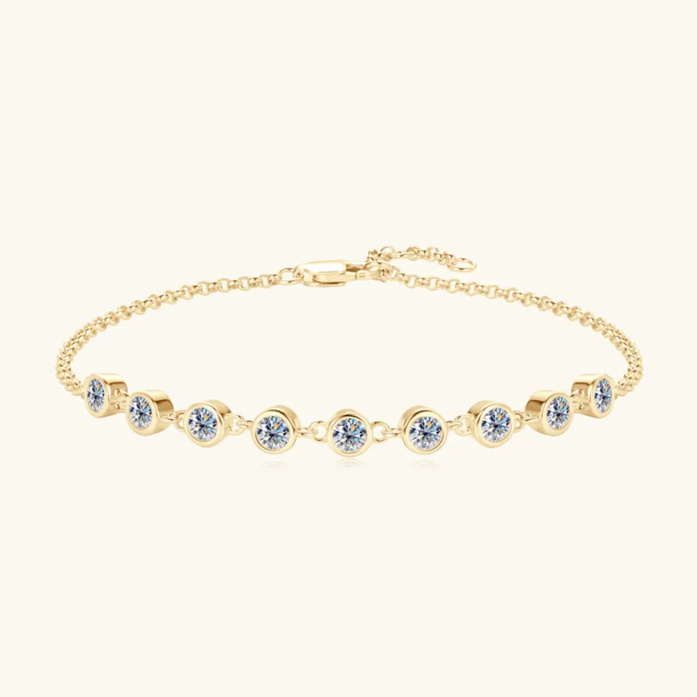 Gold-plated tennis bracelet with bezel-set moissanite stones