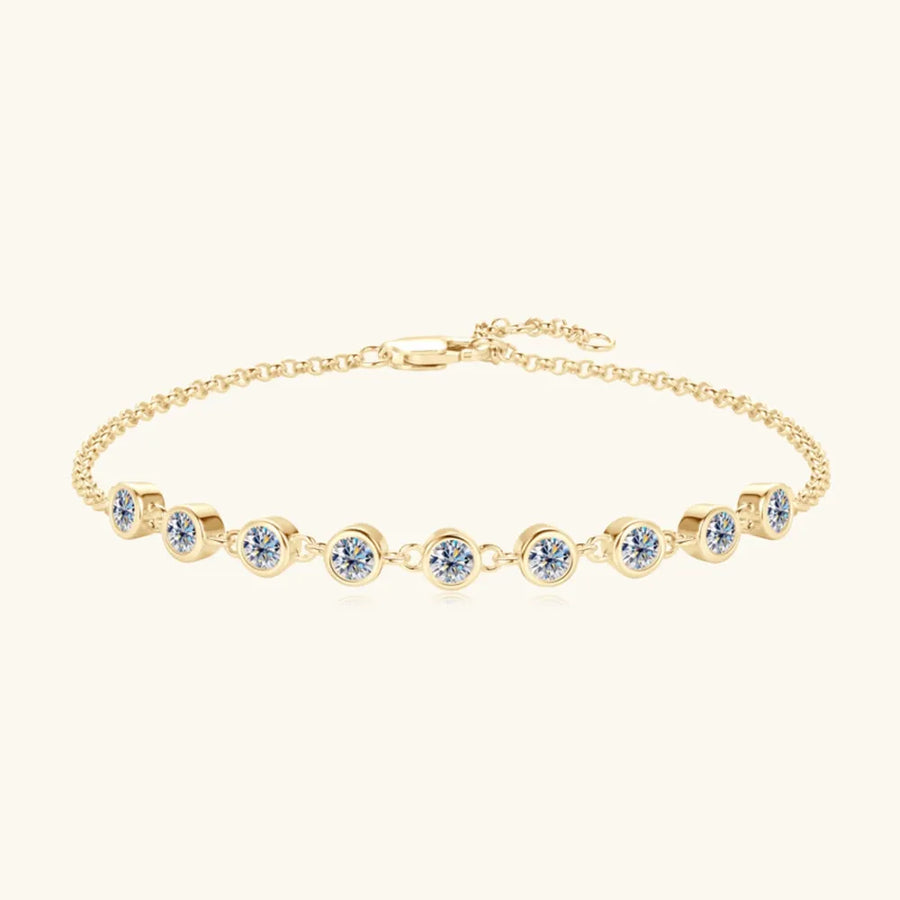 Gold-plated tennis bracelet with bezel-set moissanite stones