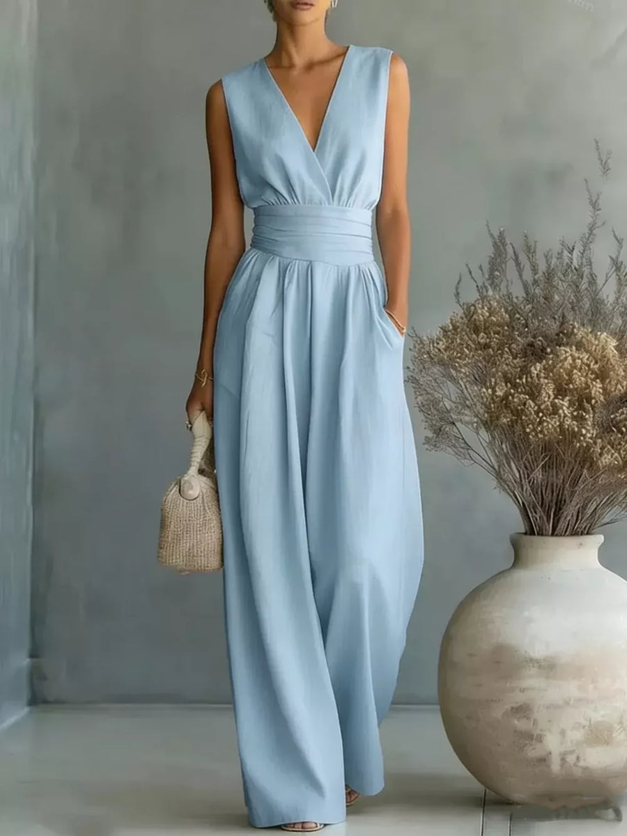 Light blue sleeveless V-neck wide-leg jumpsuit with sash belt and pockets