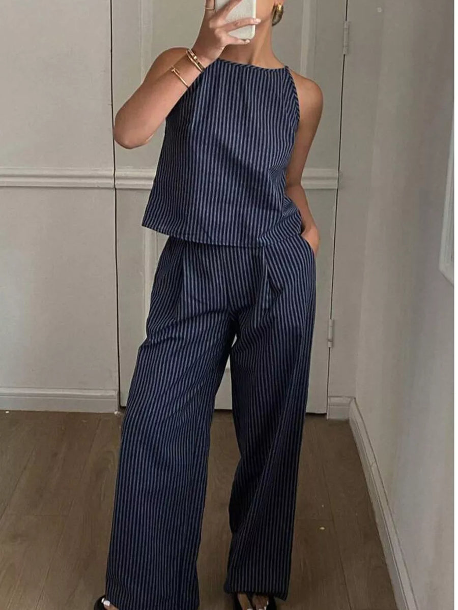 Blue striped sleeveless top and wide-leg pants set with a high neckline.