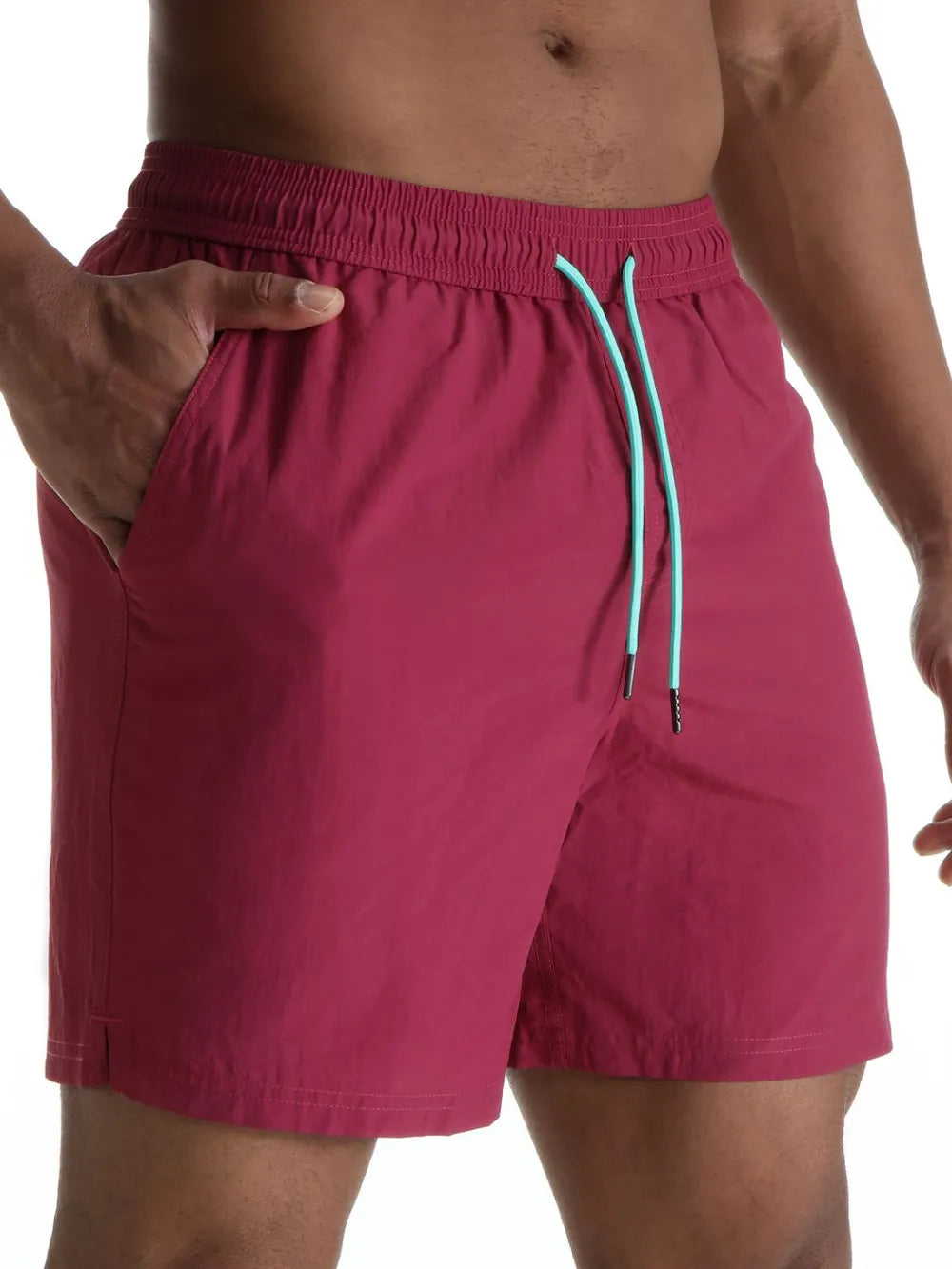 Deep Purple swim shorts with contrast teal drawcord and elastic waistband.