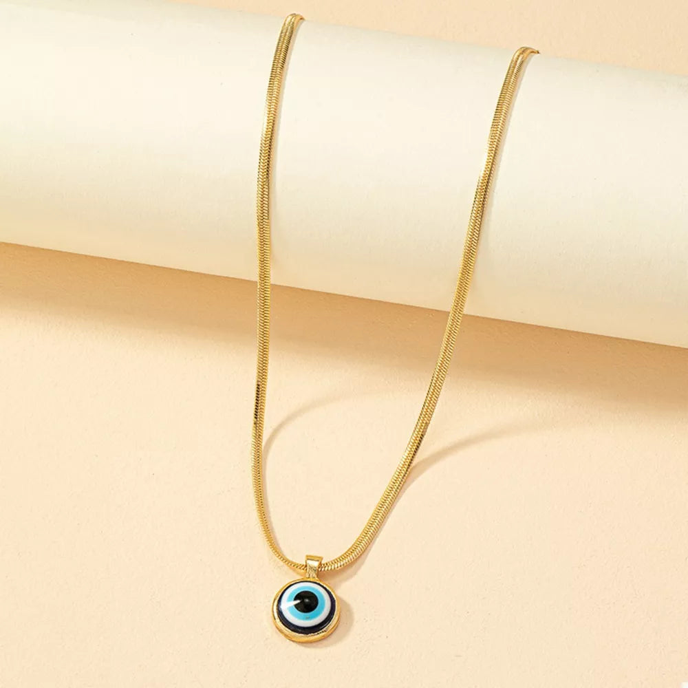 Golden necklace featuring gold-plated and evil eye motif