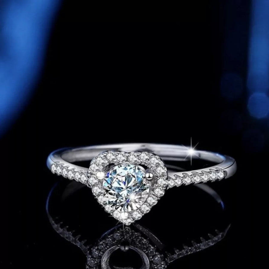 925 sterling silver Carat weight: 1ct Care instructions: Avoid wearing during ex ring in Silver with delicate silhouette