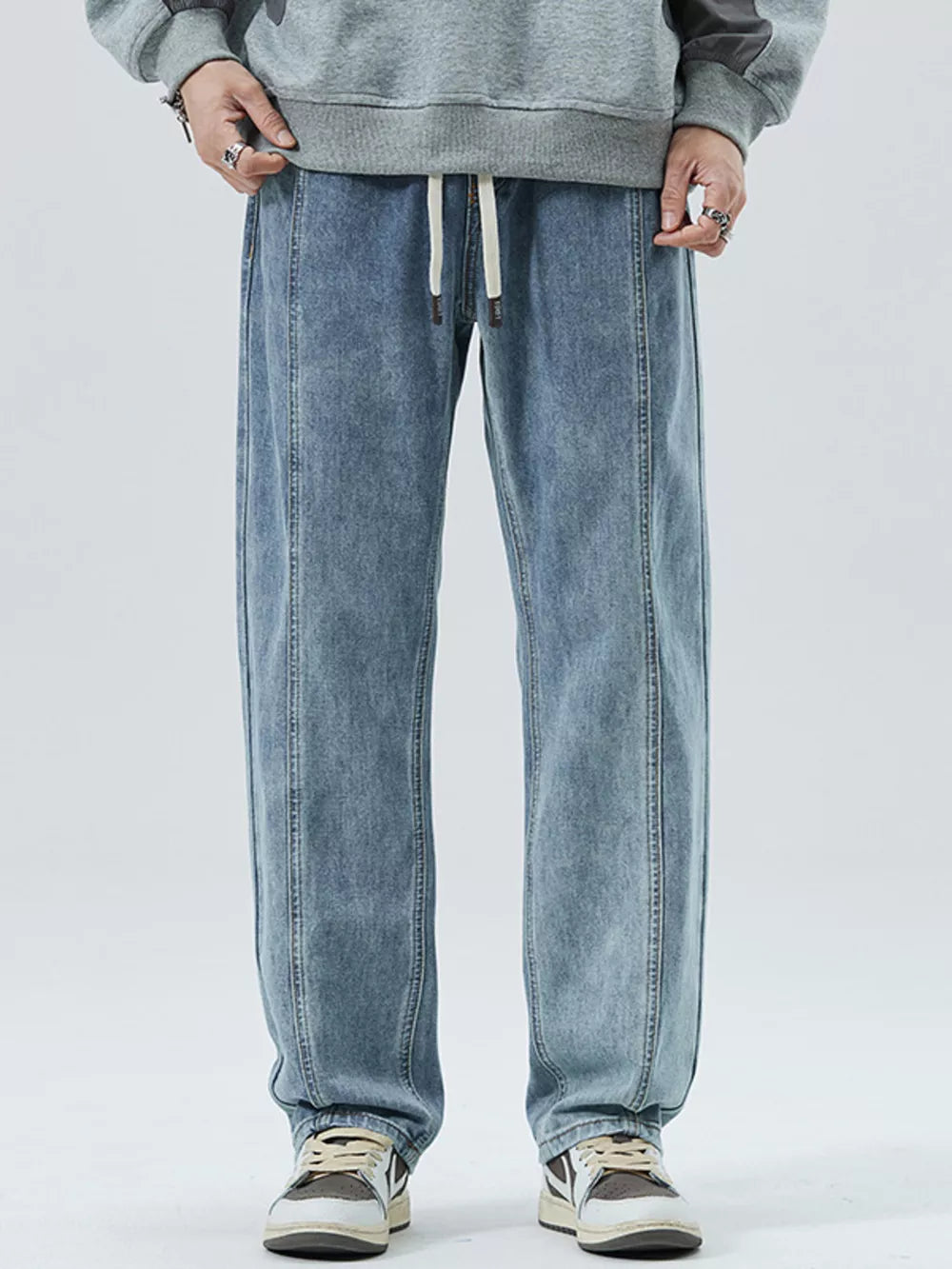Light blue 100% cotton men's jeans with drawstring and loose fit