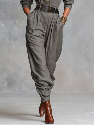 80% polyester, 20% linen Care instructions: Machine wash cold jumpsuit in olive green with relaxed silhouette