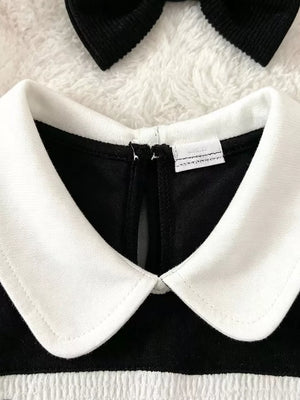 white bodysuit featuring ruffled and graphic print