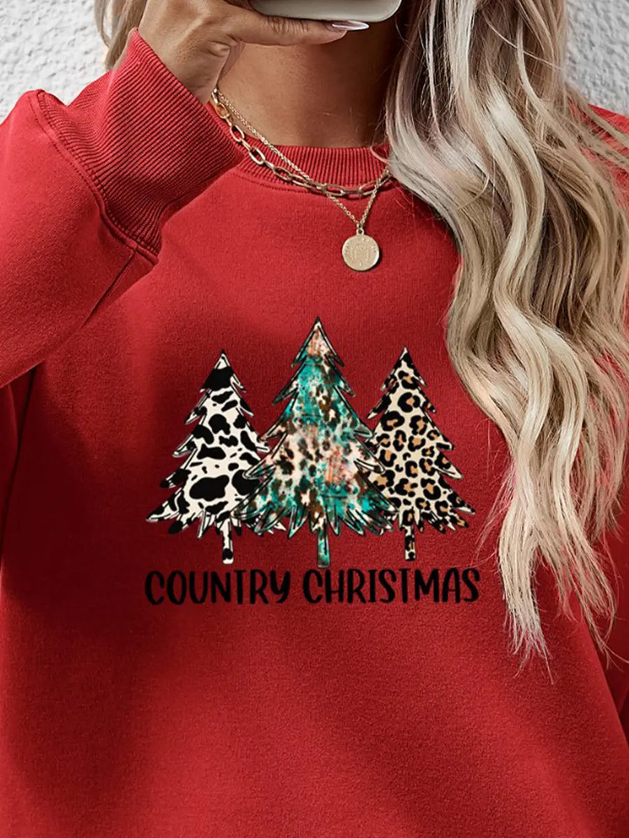 Deep Red sweatshirt with country Christmas graphic trees in cow print, leopard print, and teal.