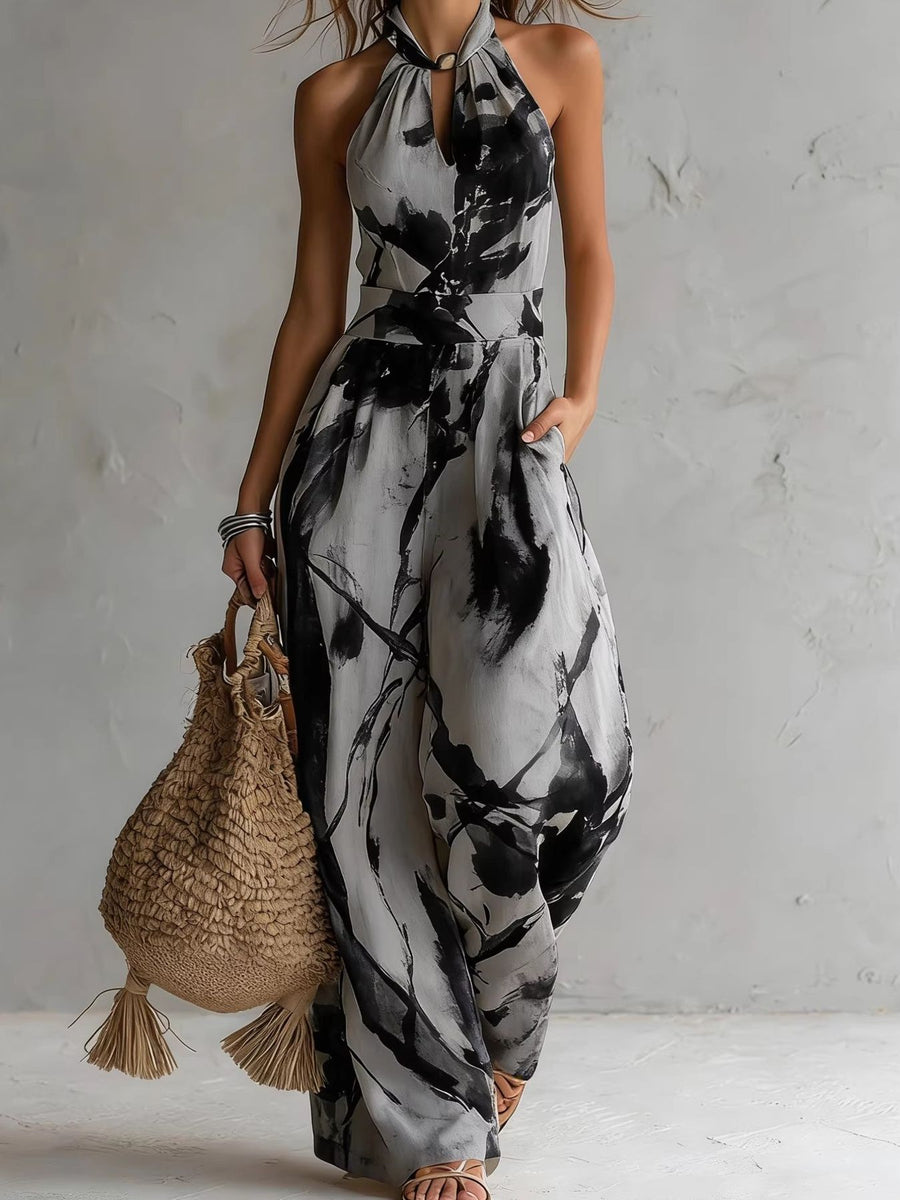 slate blue jumpsuit with tied and sleeveless