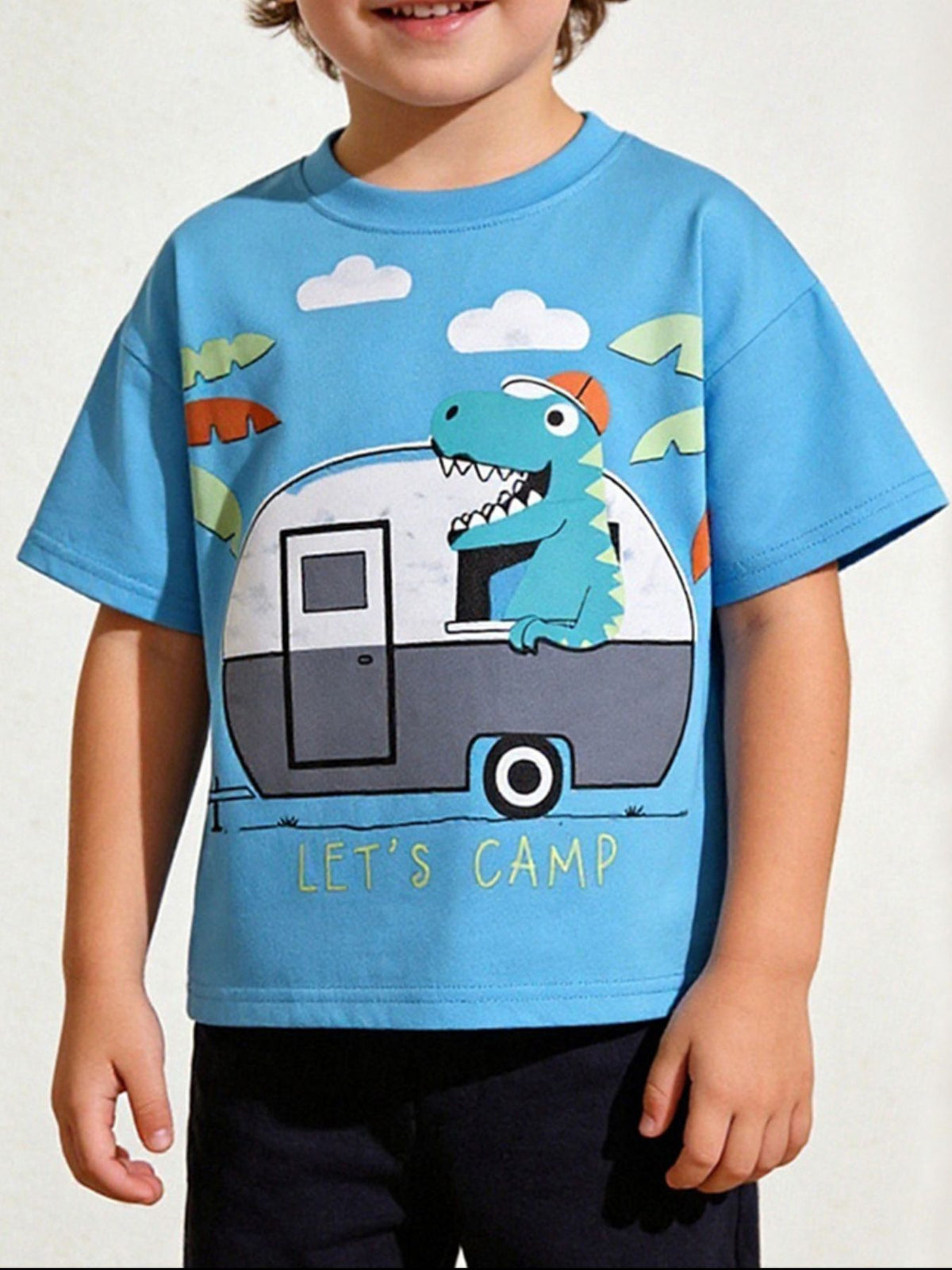 Blue toddler t-shirt with dinosaur and camper graphic and "Let's Camp" text.